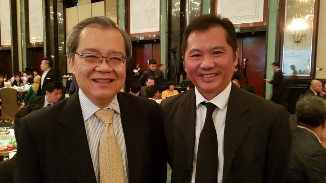 Mr Poh with Mr Lee Wai Mun, CEO of Automobile Association of Singapore